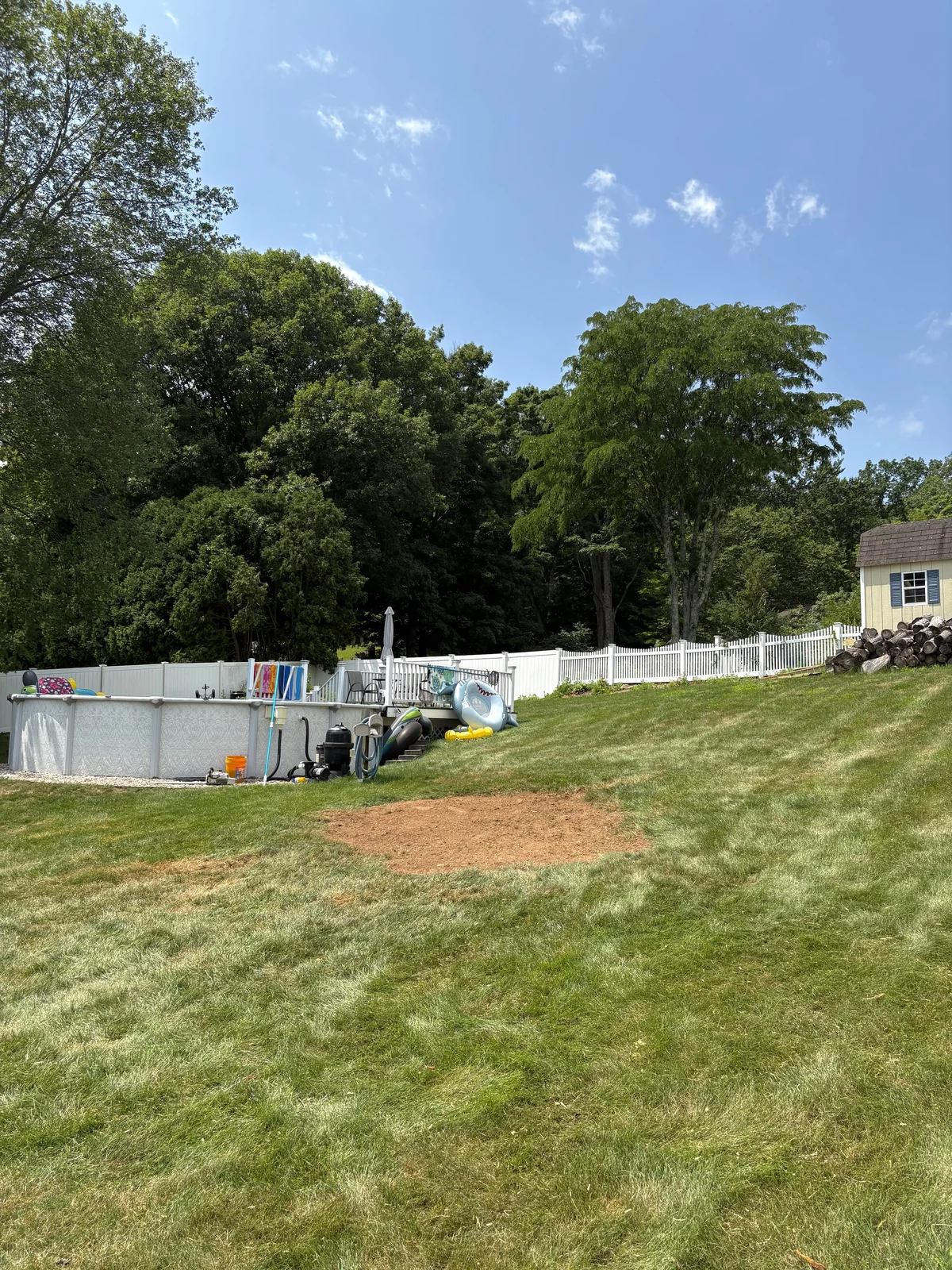 Poolside lawn after stump grinding
